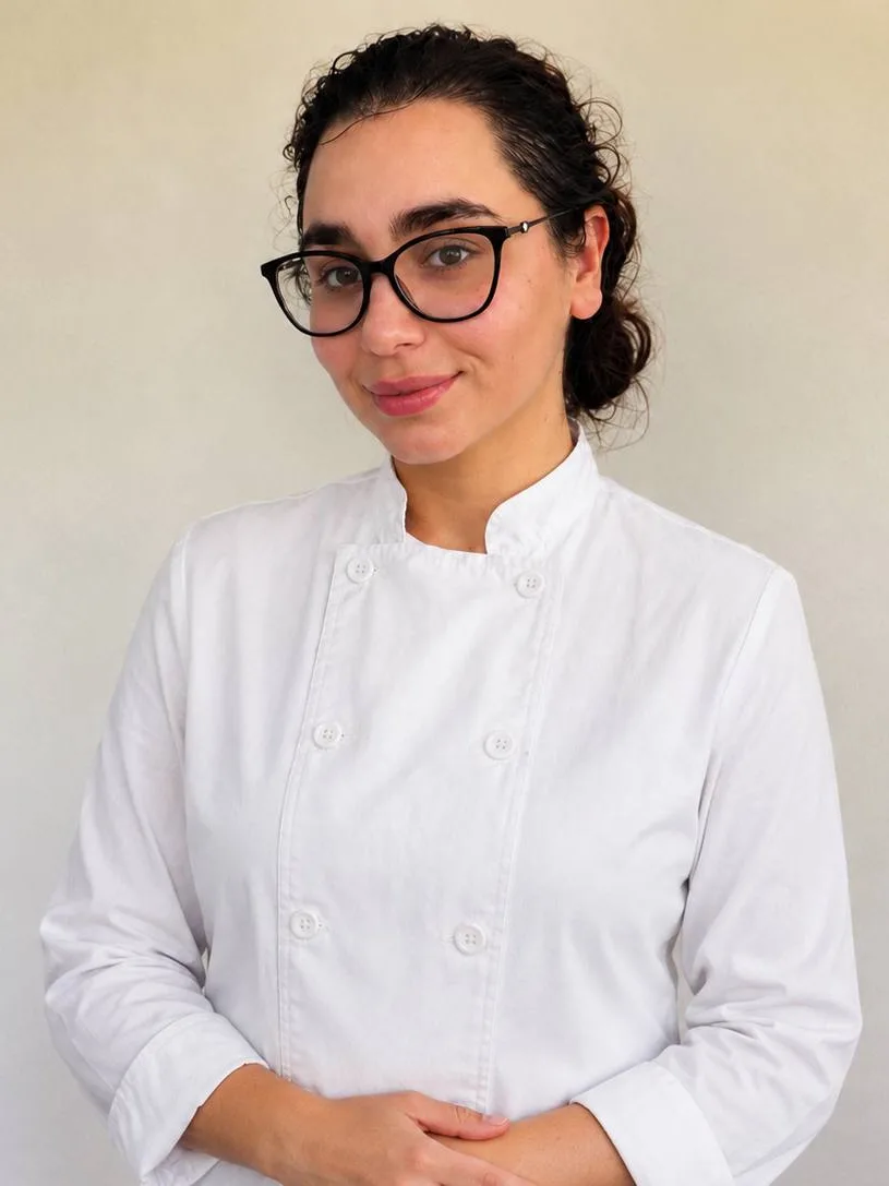 Chef Lisa in a white chef coat