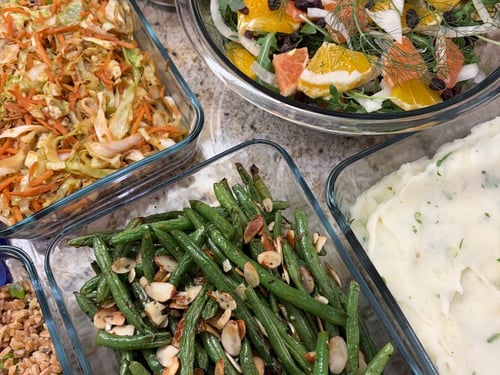 Healthy plate of fish, roasted vegetables and greens