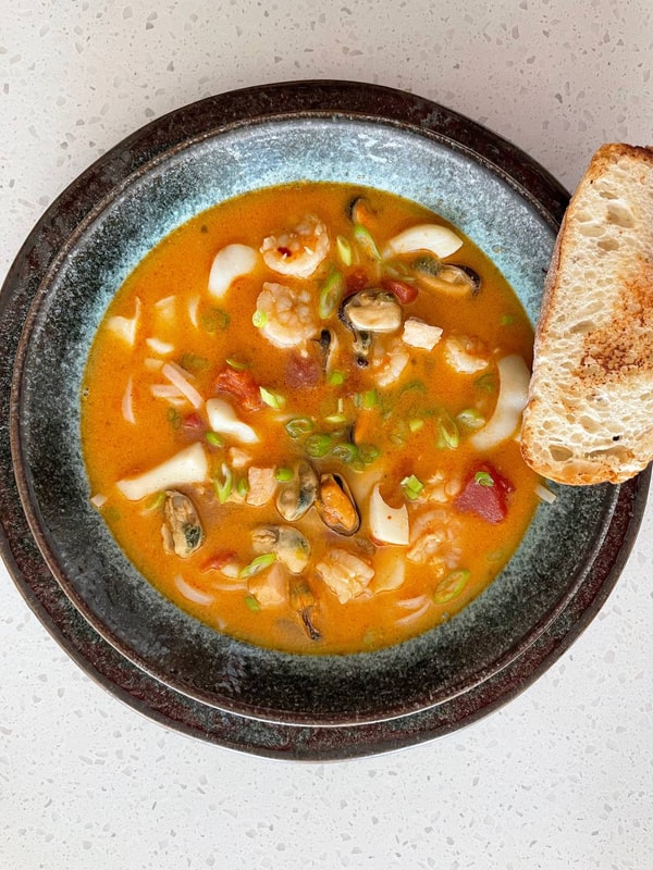 Seafood Soup with Rice Noodles and Toasted Bread