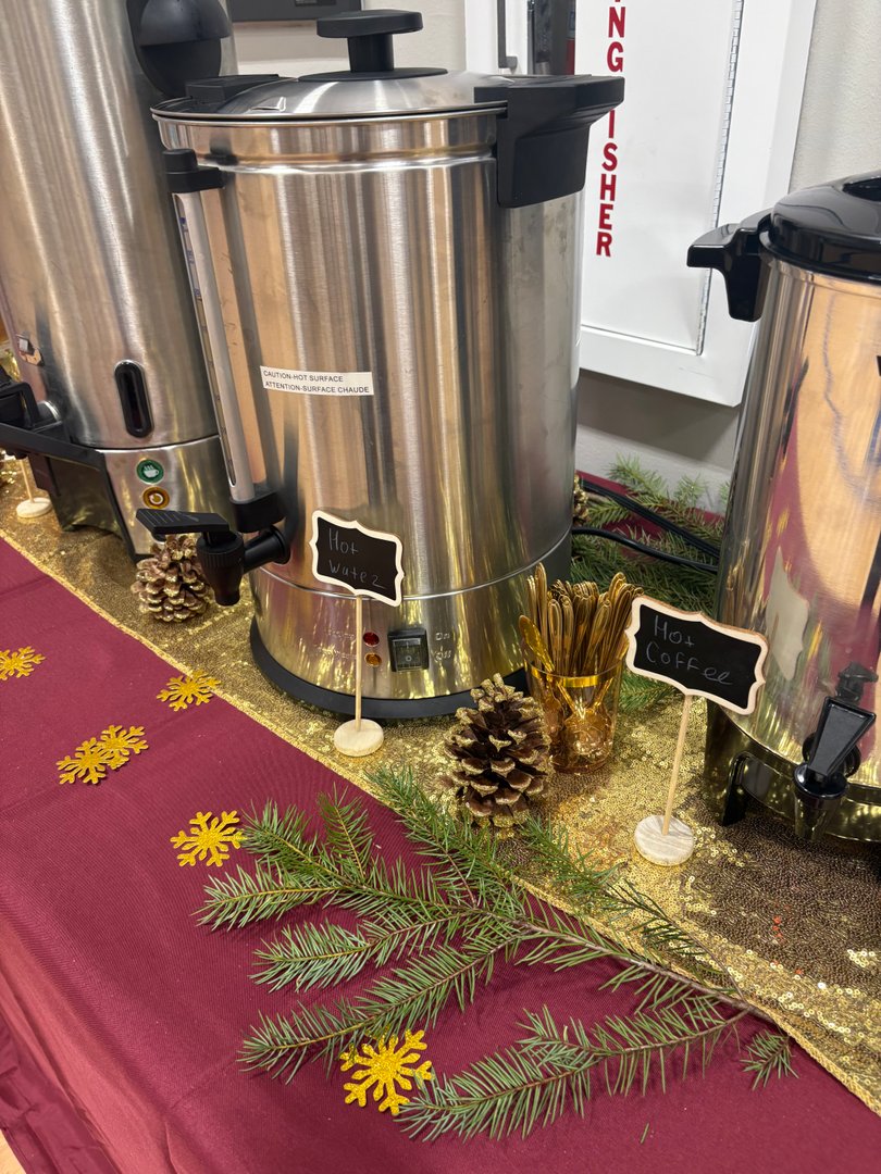 Hot coffee and hot water dispensers for a beverage station.